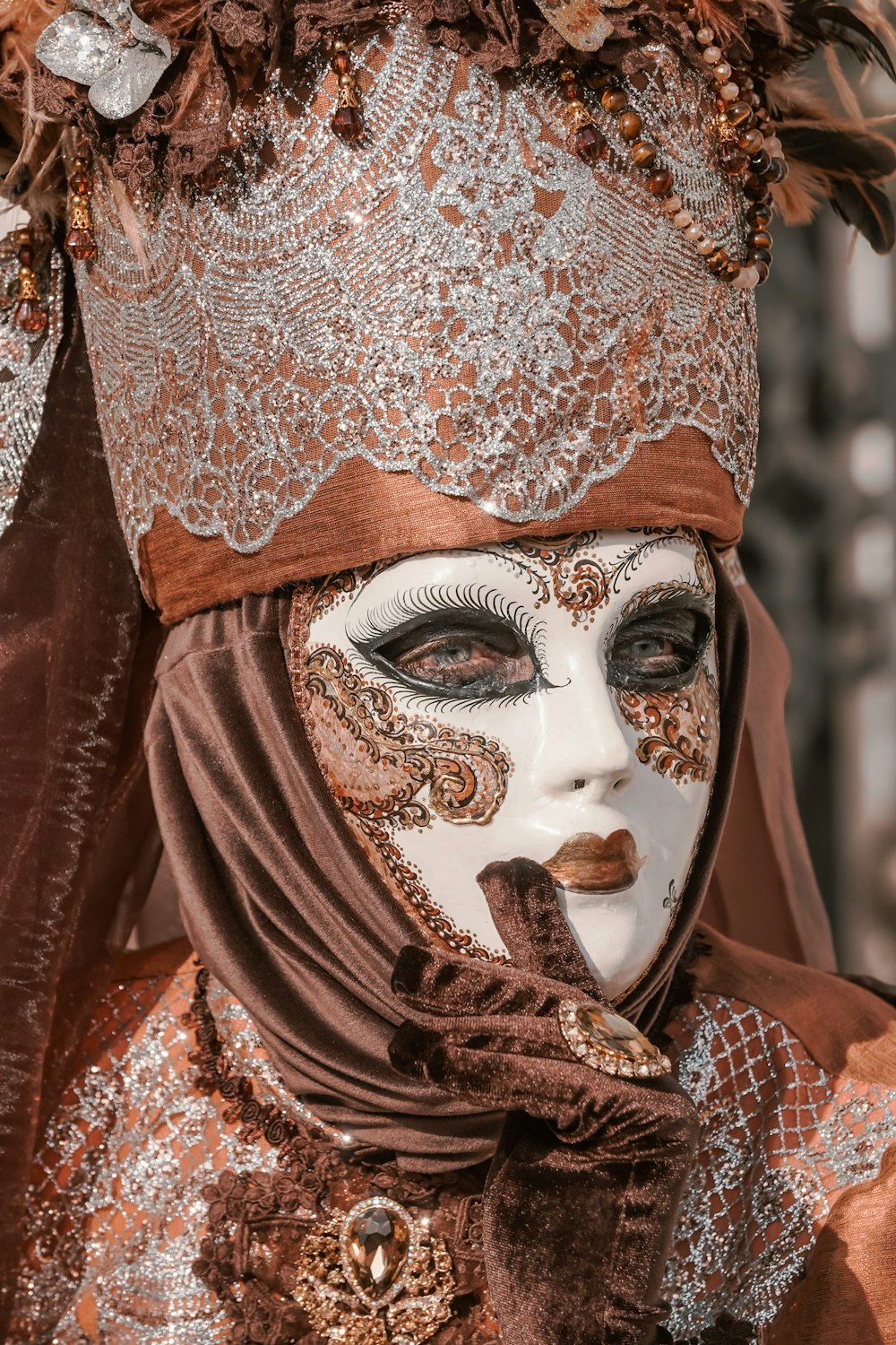 a close up of a person wearing a mask