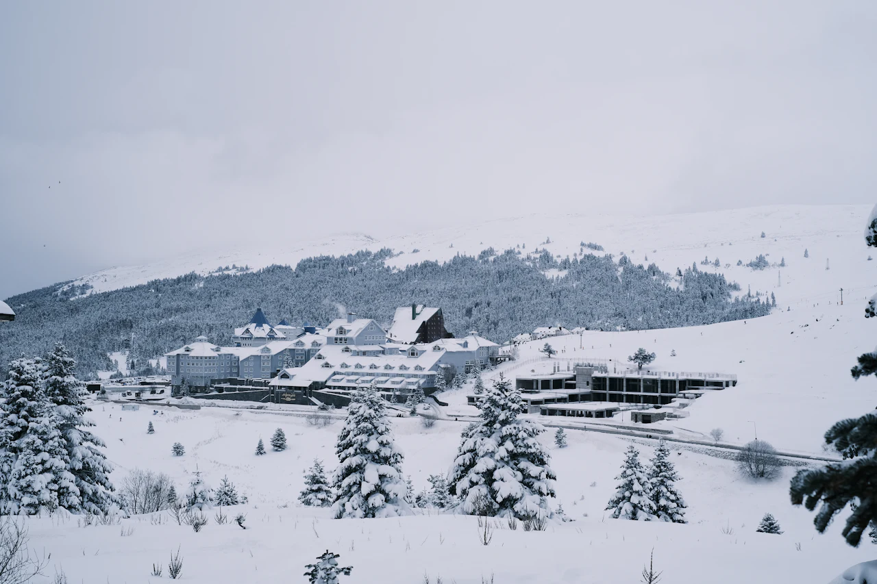 Snow-covered slopes and chalets on Uludağ