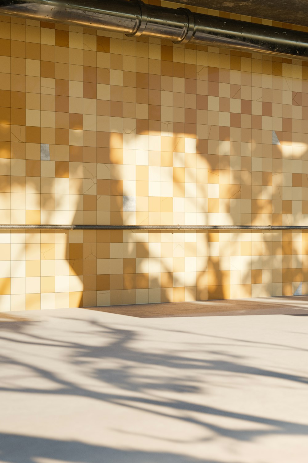 a man riding a skateboard down a sidewalk