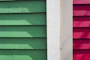 Vibrant wood siding gleaming post-pressure wash with Veewave branding colors subtly reflected.