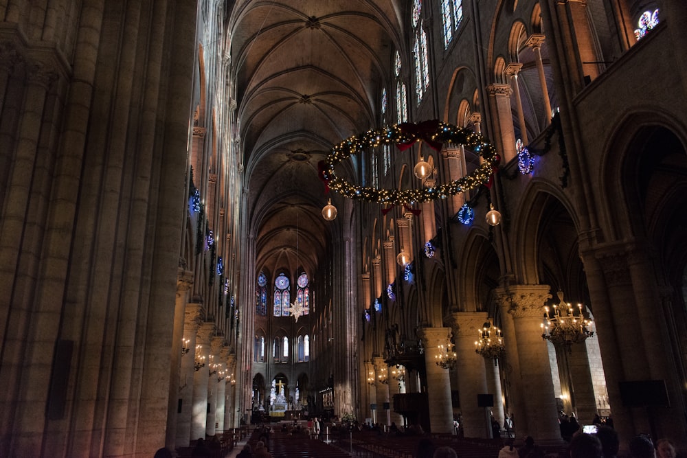 a large cathedral with a chandelier hanging from the ceiling