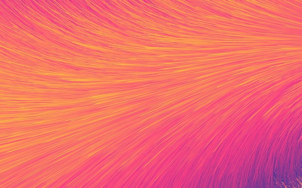 a close up of a pink and orange background