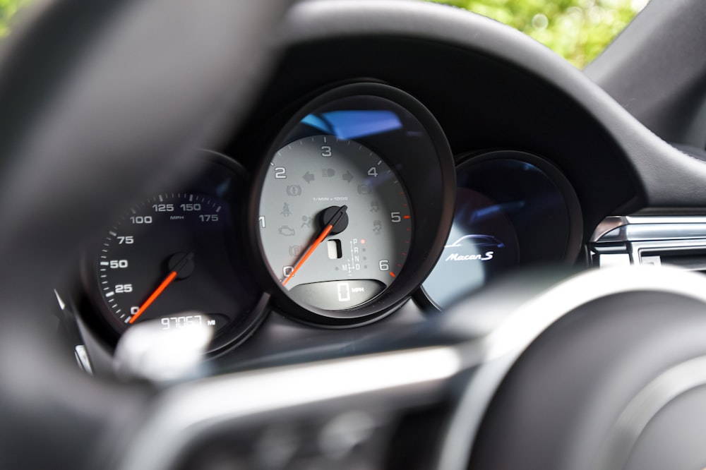 a close up of a speedometer in a car