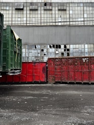 a large truck parked in front of a building
