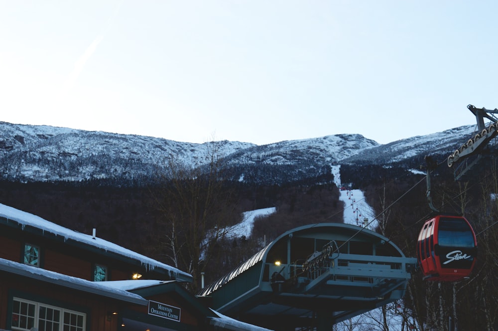 a ski lift going up the side of a mountain