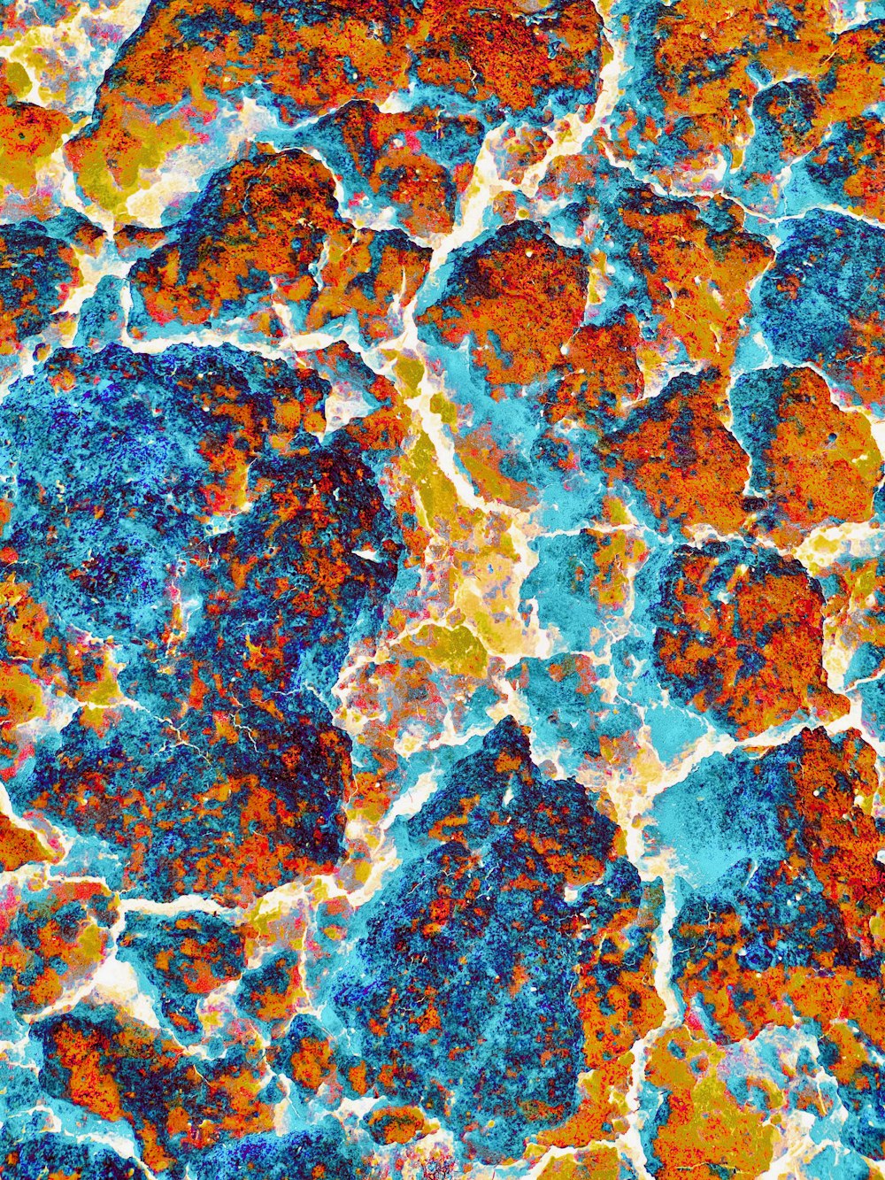 a close up of a blue and orange substance