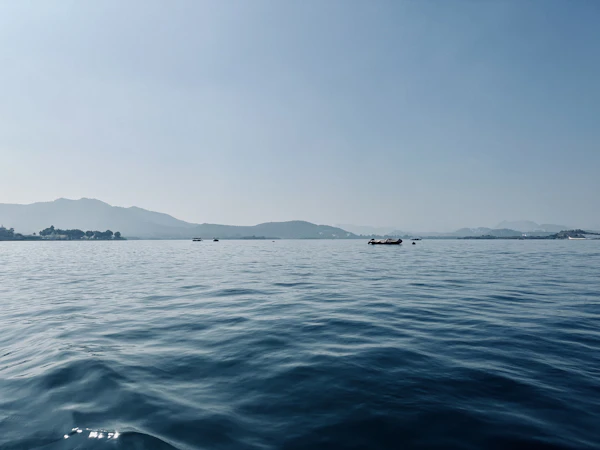 A calm view of the lake and palaces