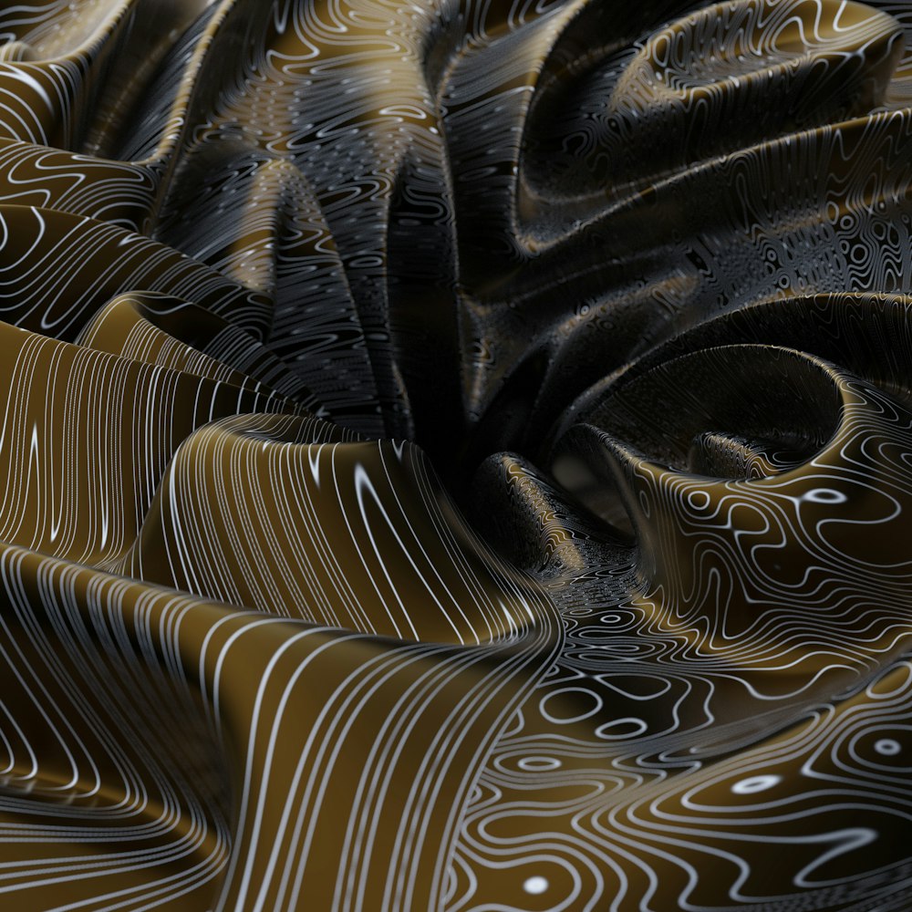a close up of a black and gold fabric