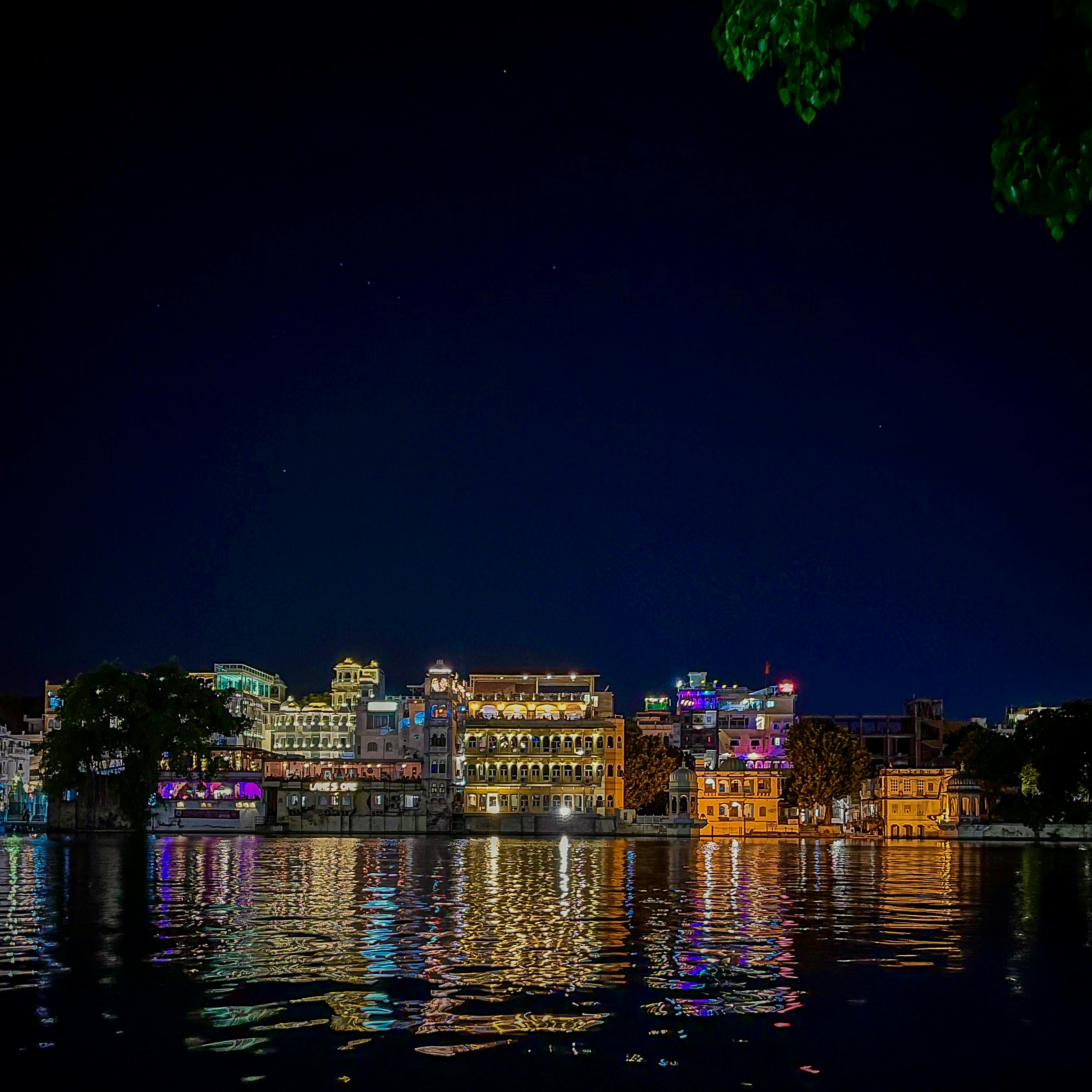 a view of a city at night from across the water