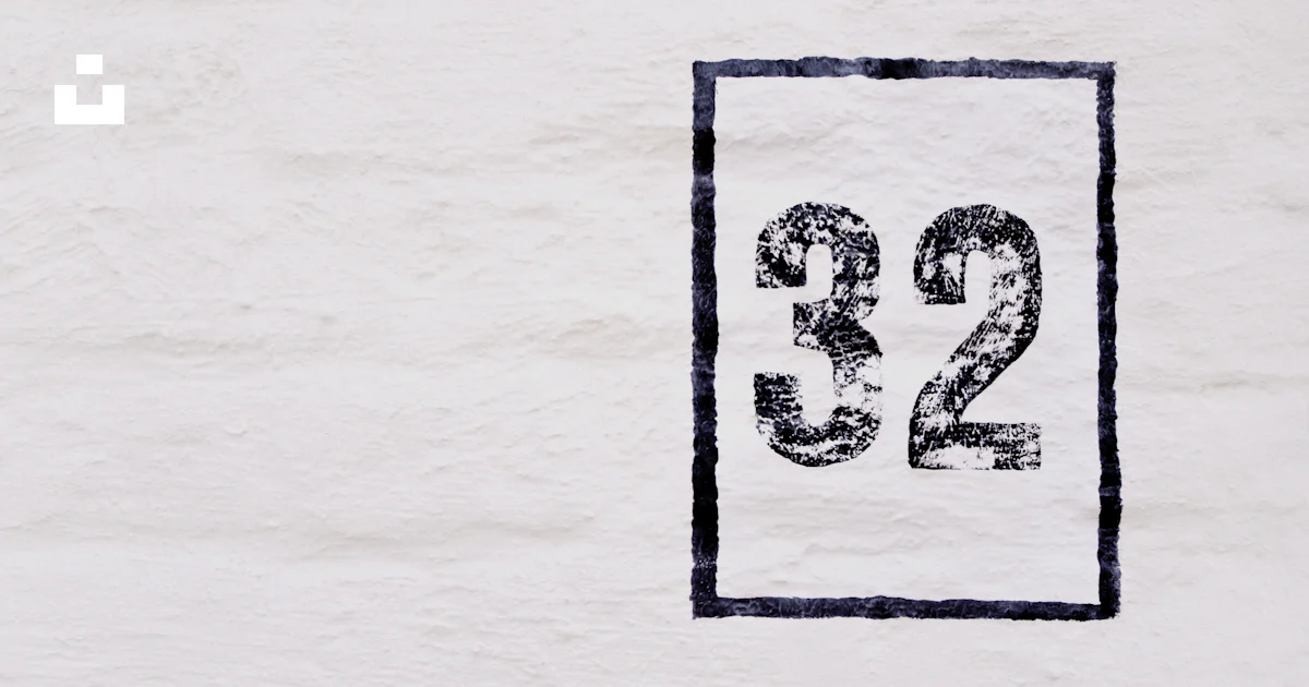 Twenty Two Draw A drawing of the number twenty two on a white wall photo – Free Number ...