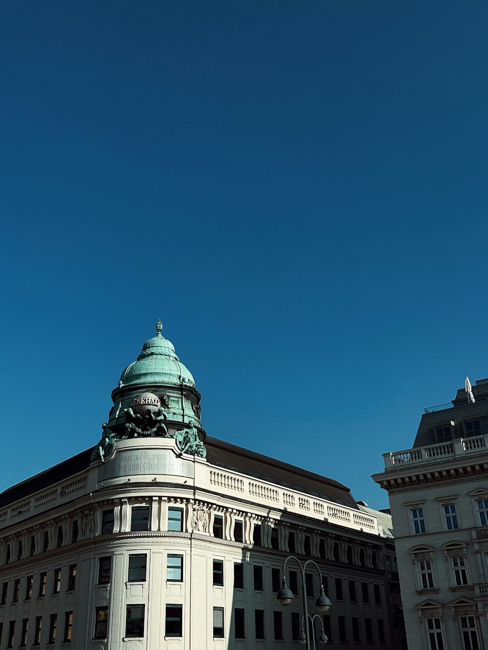 a large building with a clock on the top of it