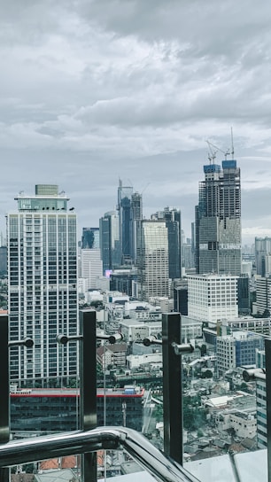 A skyline view showcasing modern buildings under construction.