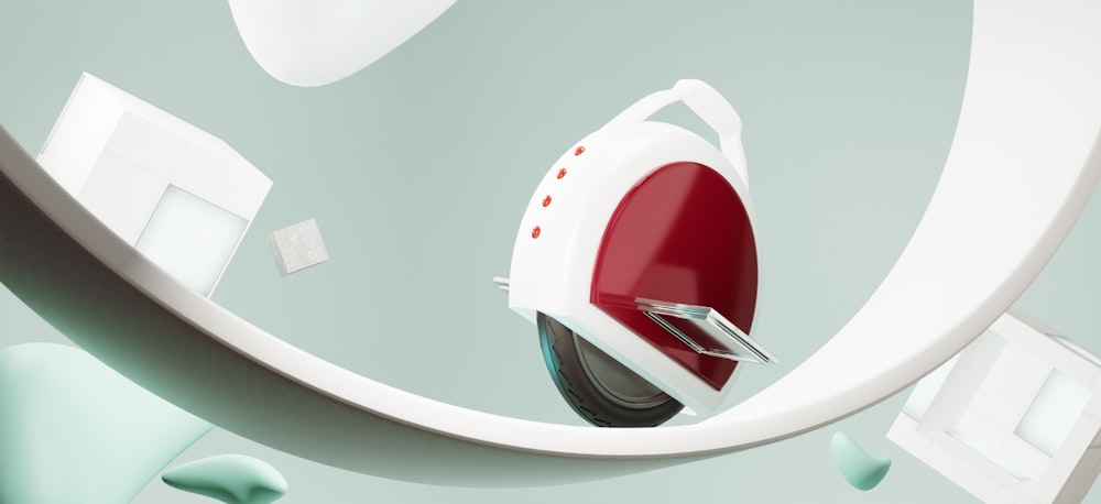 a close up of a red and white electric iron