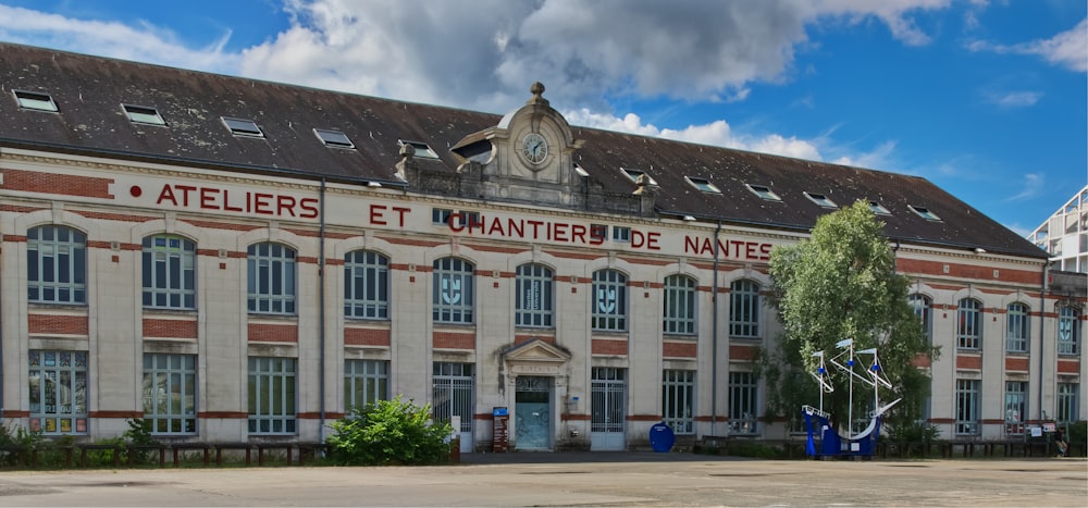 a large building with a clock on the front of it