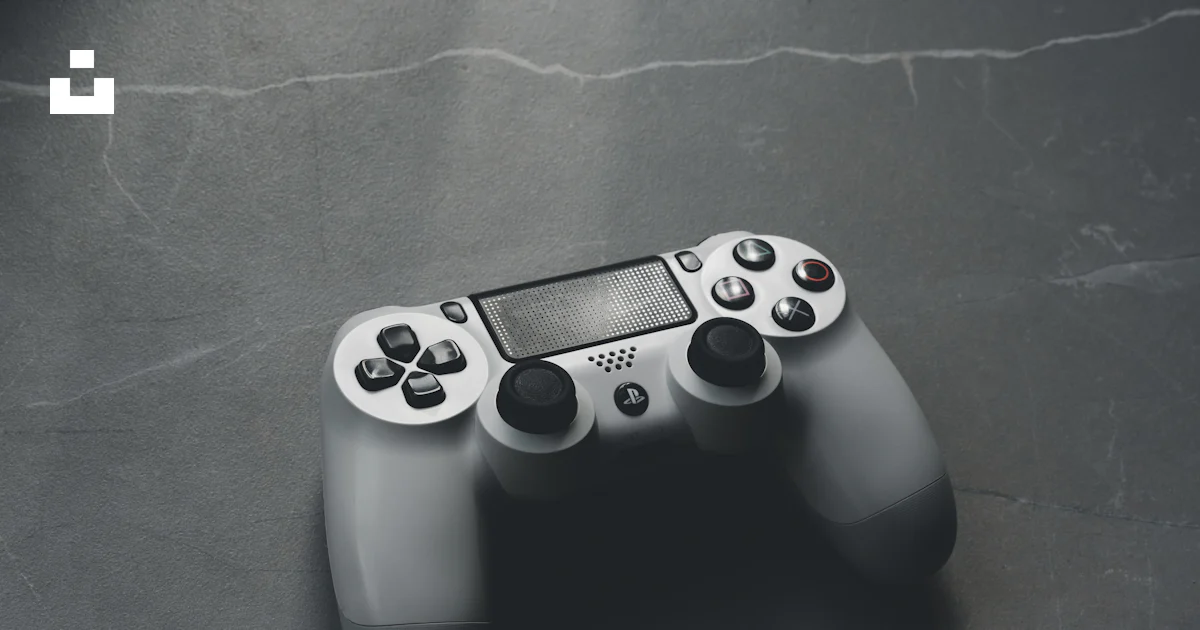 A close up of a video game controller photo – Free Controller Image on ...