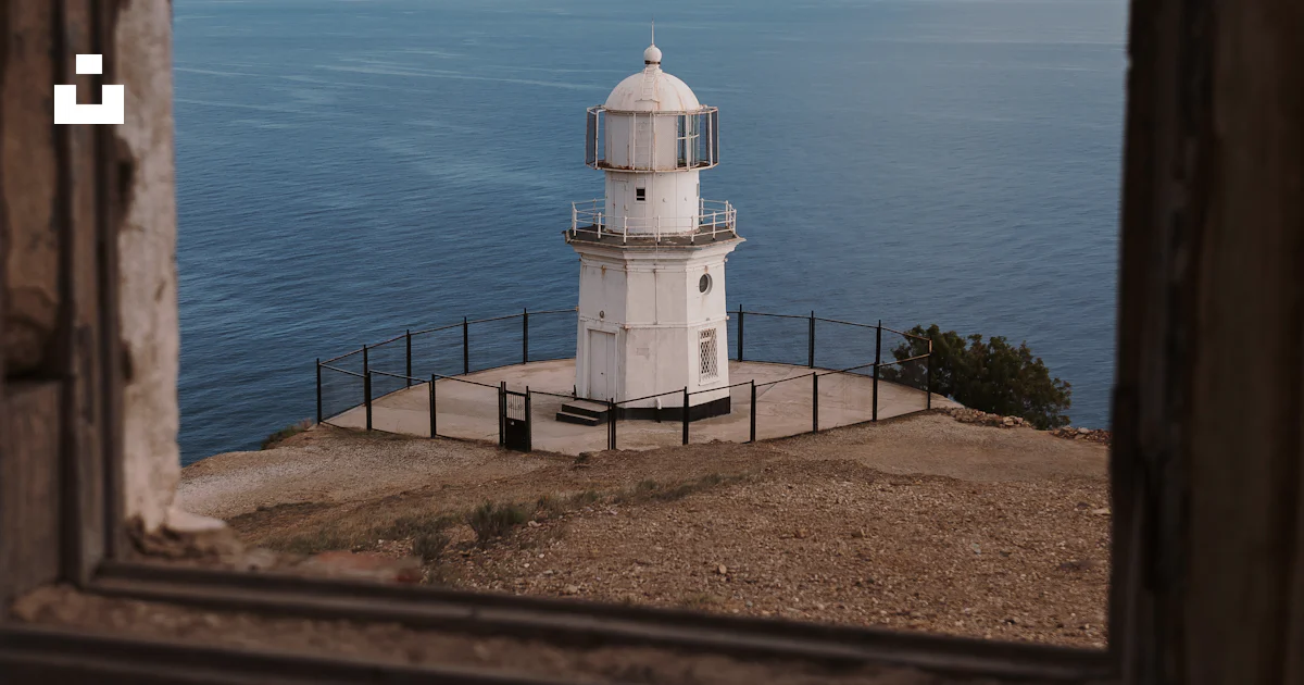 Lighthouse Window Texture A view of a lighthouse through a window photo – Free Lighthouse Image ...