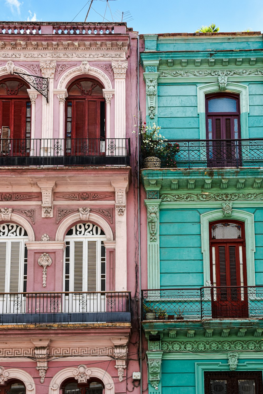 a multicolored building with balconies and balconies