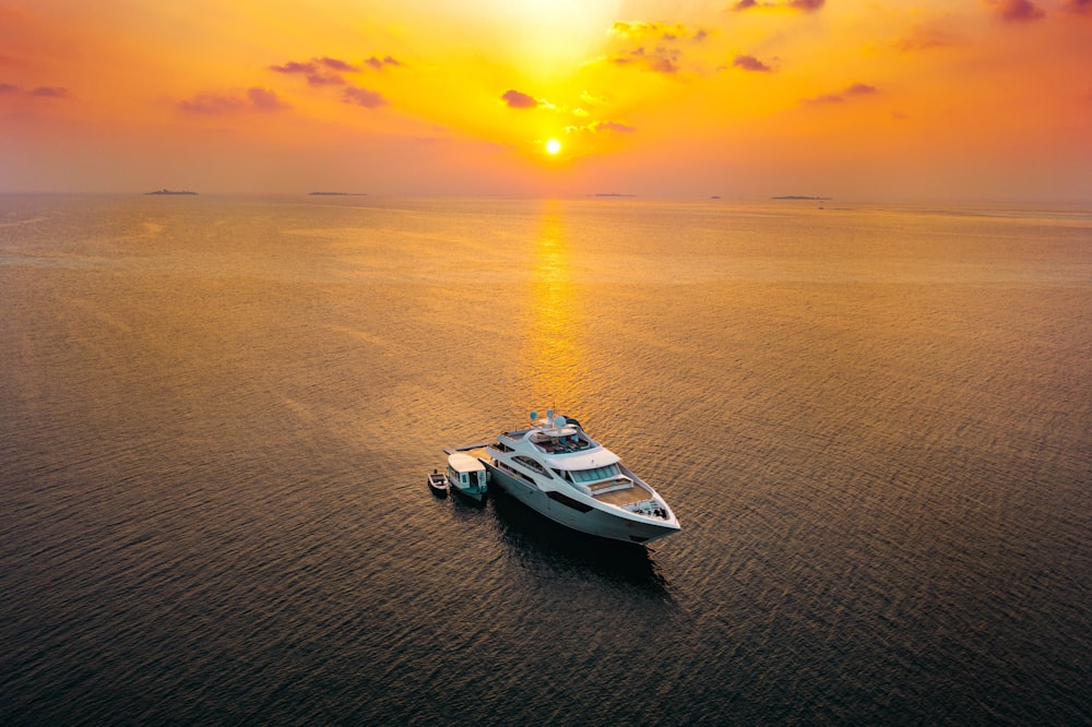 a boat floating on top of a large body of water