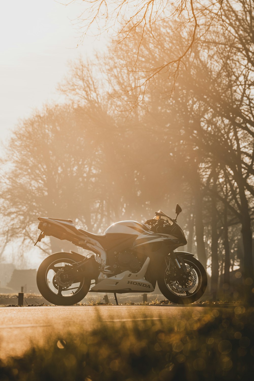 a motorcycle parked on the side of a road