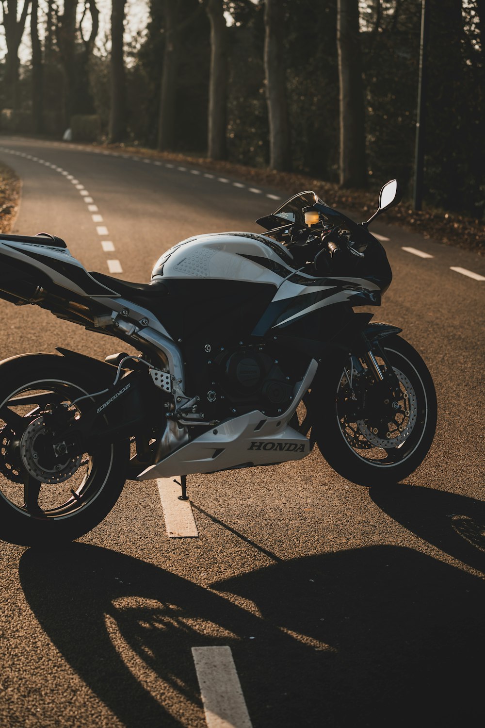 a motorcycle parked on the side of the road