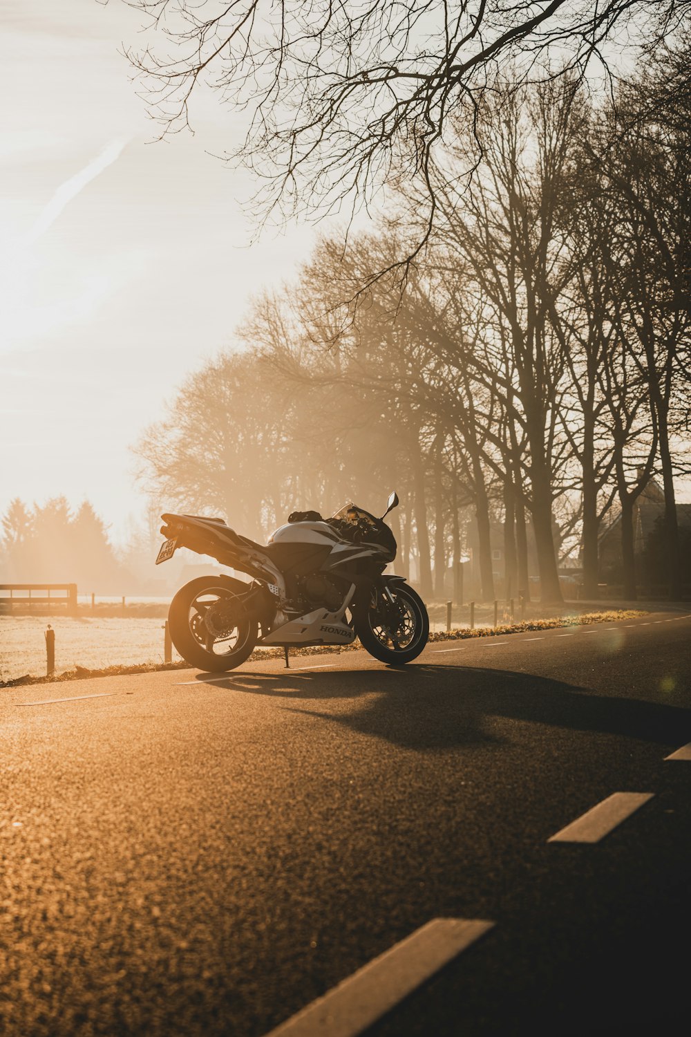 a motorcycle parked on the side of the road