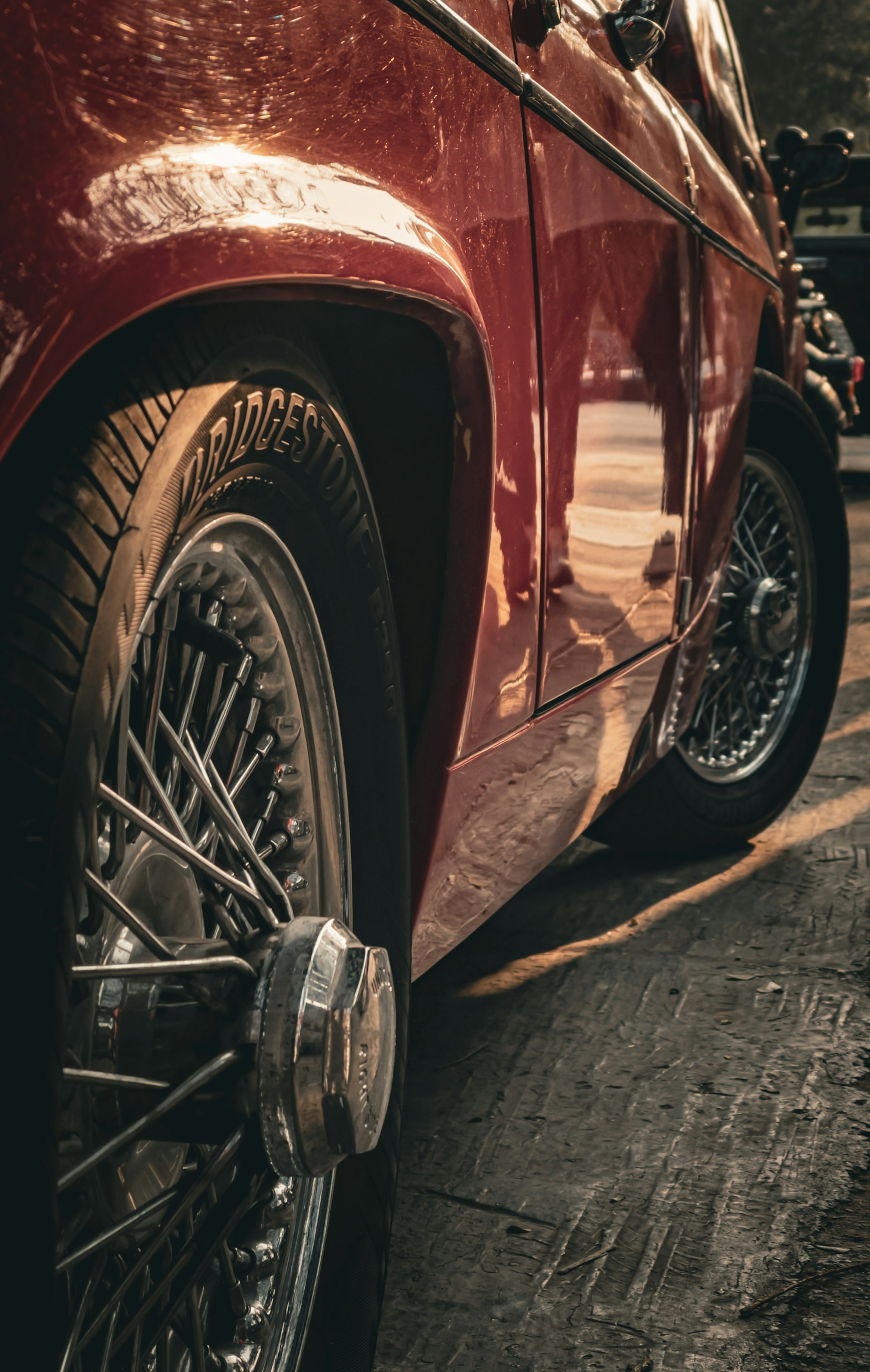 a red car parked on the side of the road