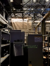 a room with a lot of shelves and lights