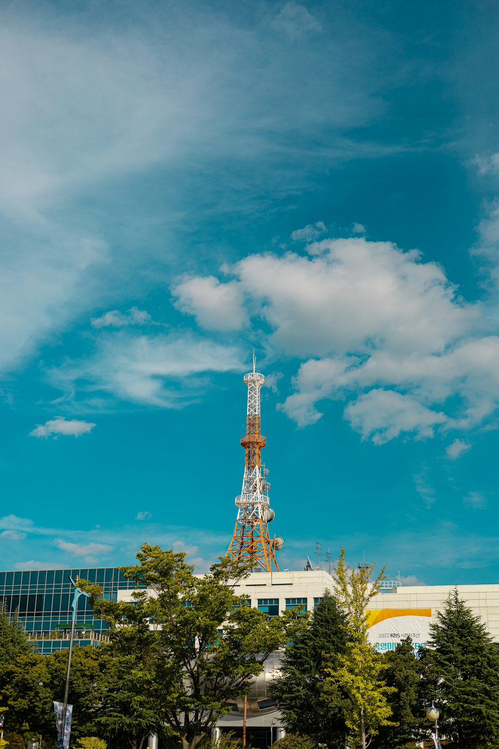 a very tall tower with a sky background