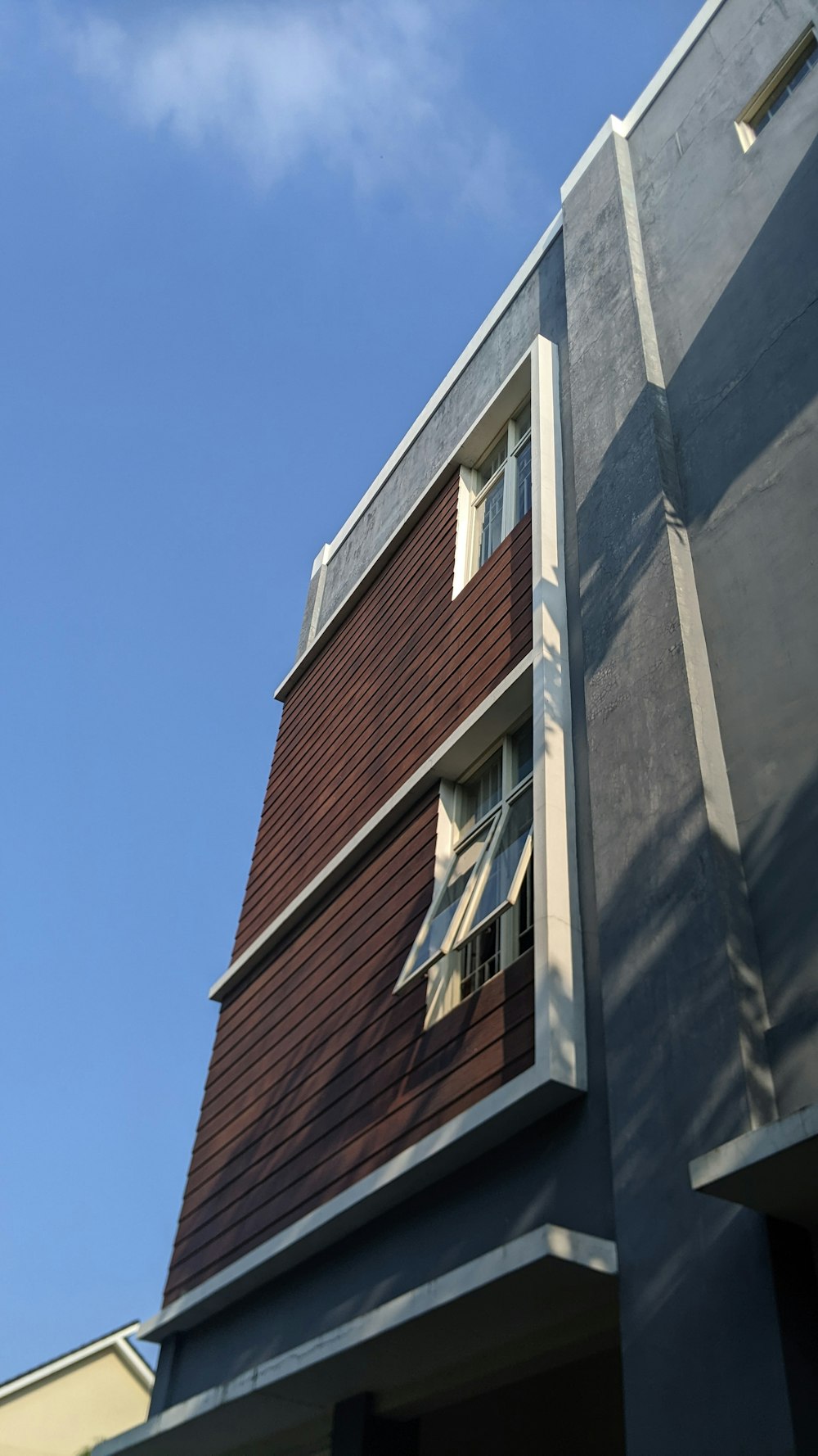 a tall building with a clock on the side of it