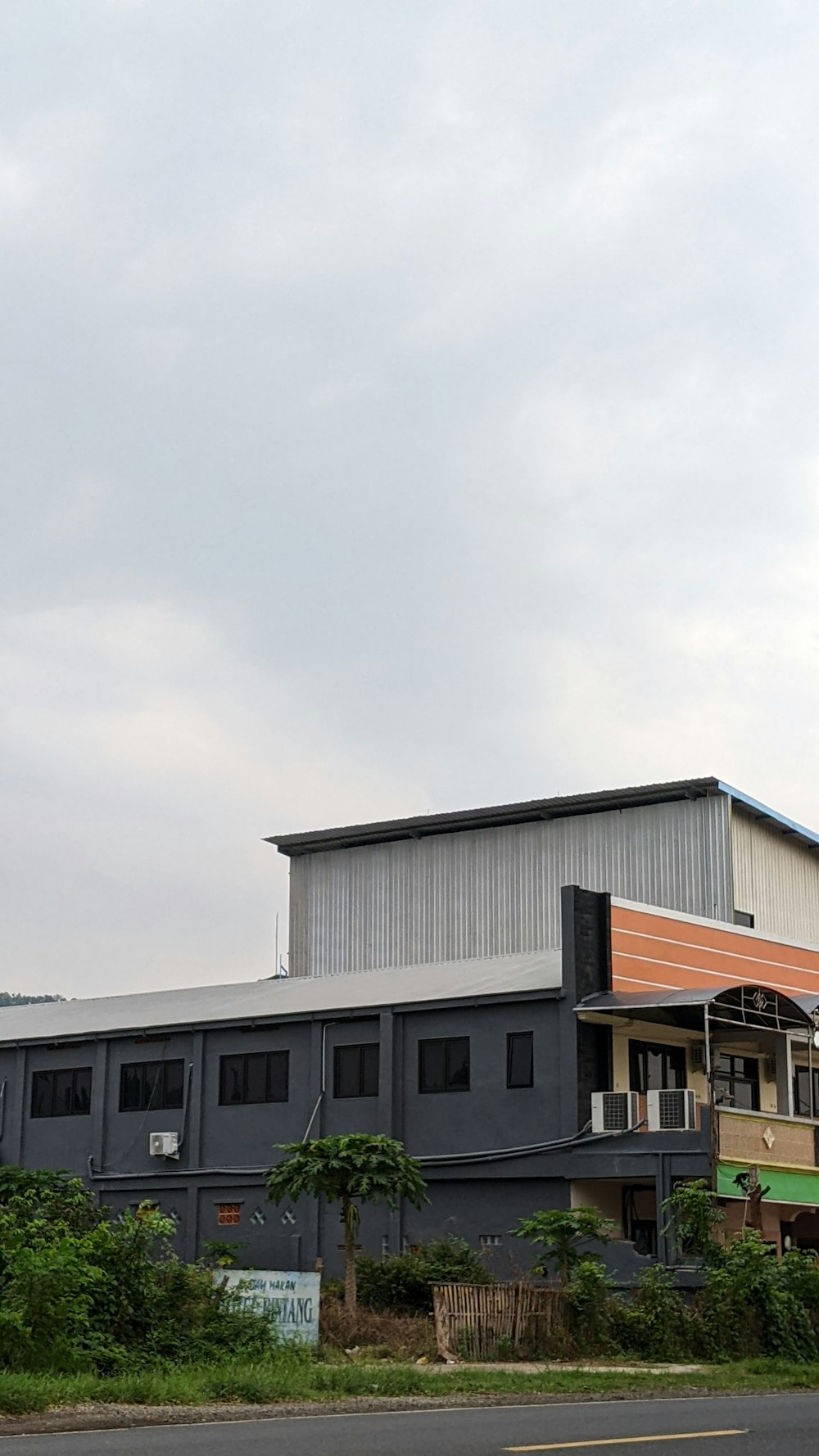 a large building with a clock on the side of it