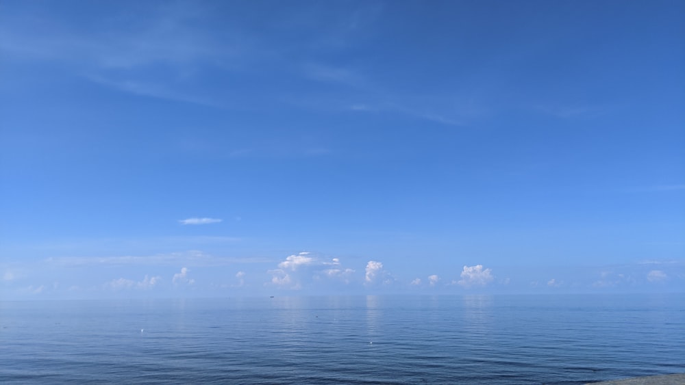 a view of the ocean from the shore of a beach