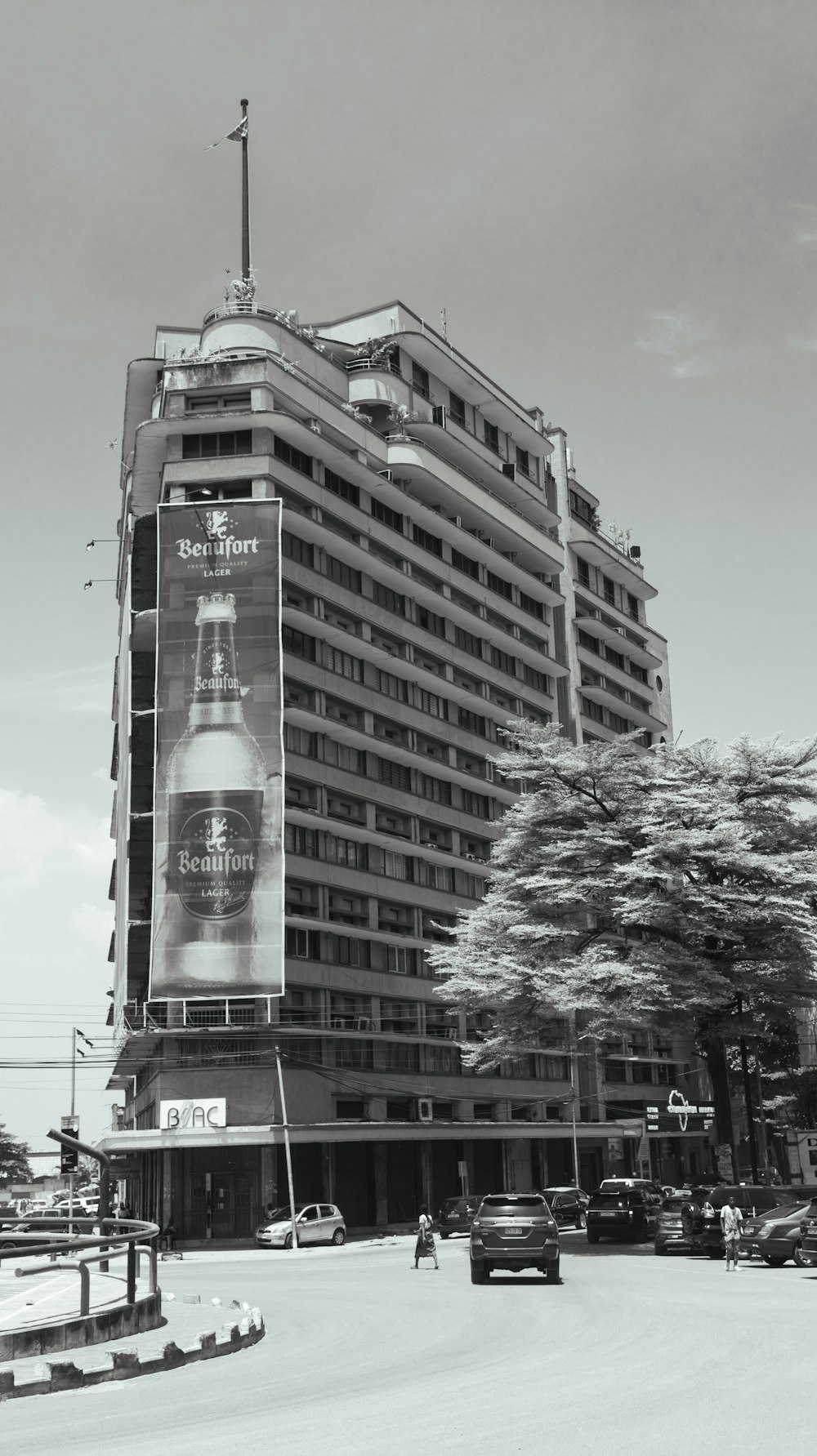 a tall building with a large advertisement on the side of it