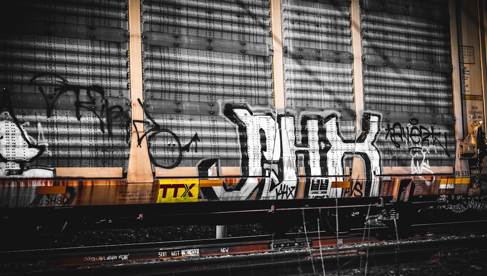 graffiti on the side of a train car