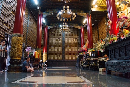 Luxurious prayer hall with elegant golden decor and soft lighting.