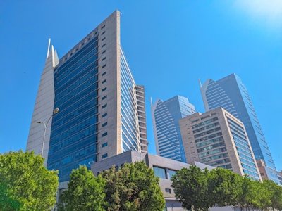 a group of tall buildings sitting next to each other