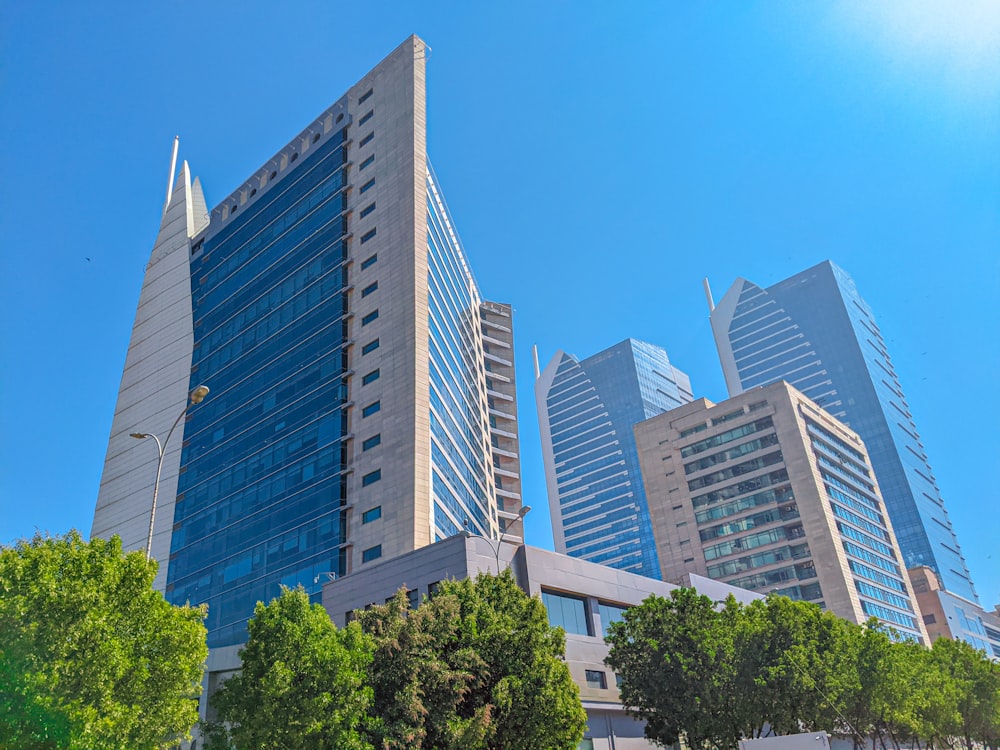 a group of tall buildings sitting next to each other