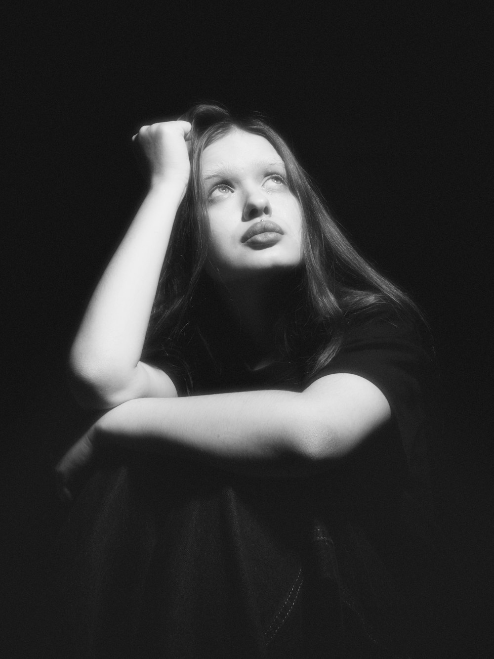 a black and white photo of a woman