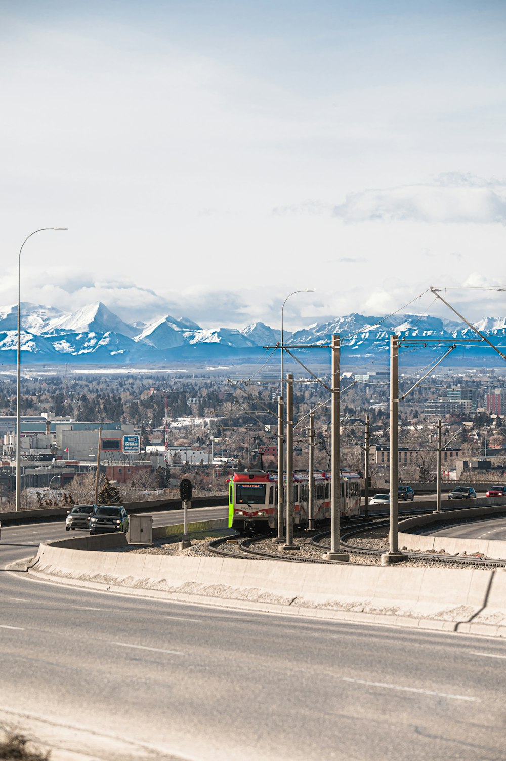 a view of a city with mountains in the background