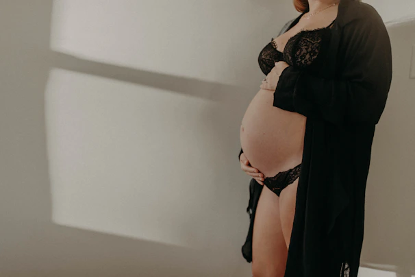 Pregnant woman with black lingerie