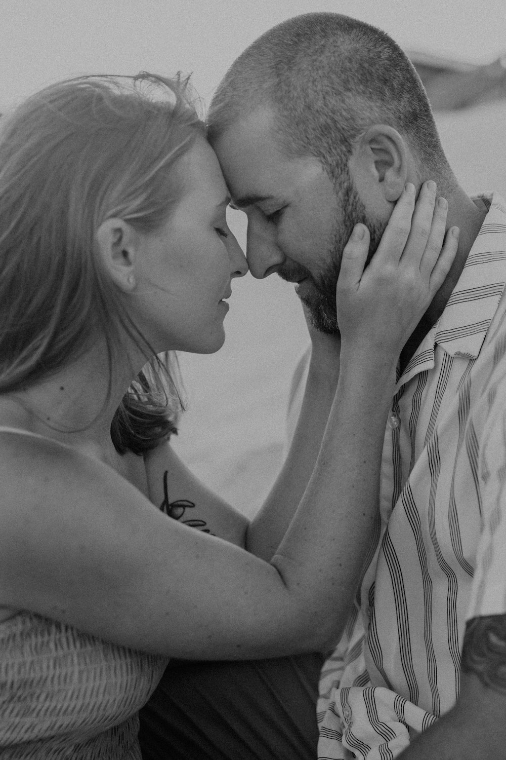 a man and a woman sitting next to each other