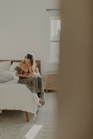 A breastfeeding room designed for comfort and privacy, softly lit and cozy.