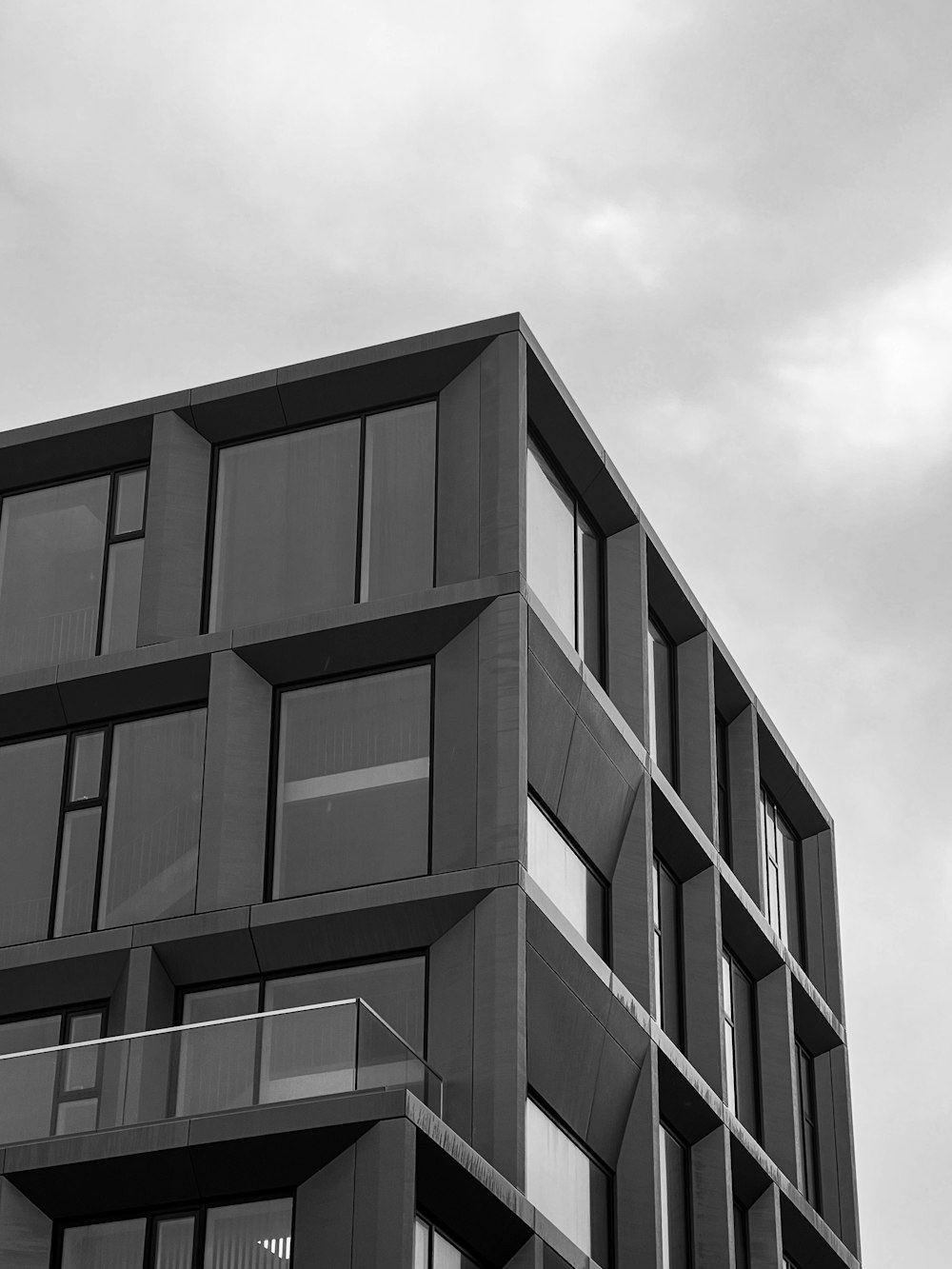 a black and white photo of a tall building