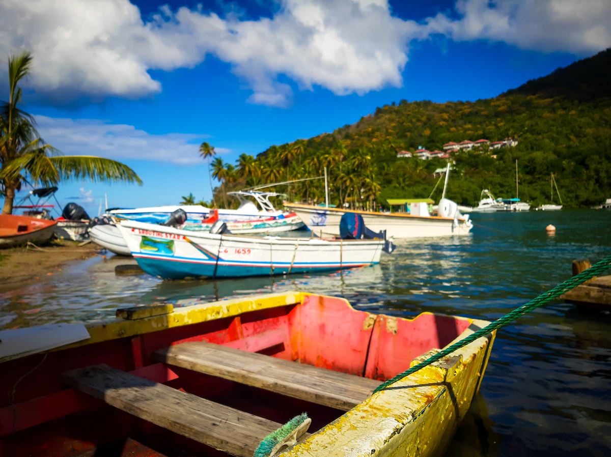 Colourful fishing boats pulled close to the Soufrière waterfront in Saint Lucia
