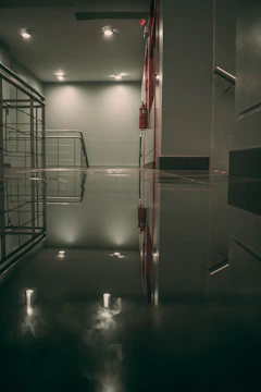 A sleek office lobby featuring Flammaguard's fire alarm and sprinkler systems.