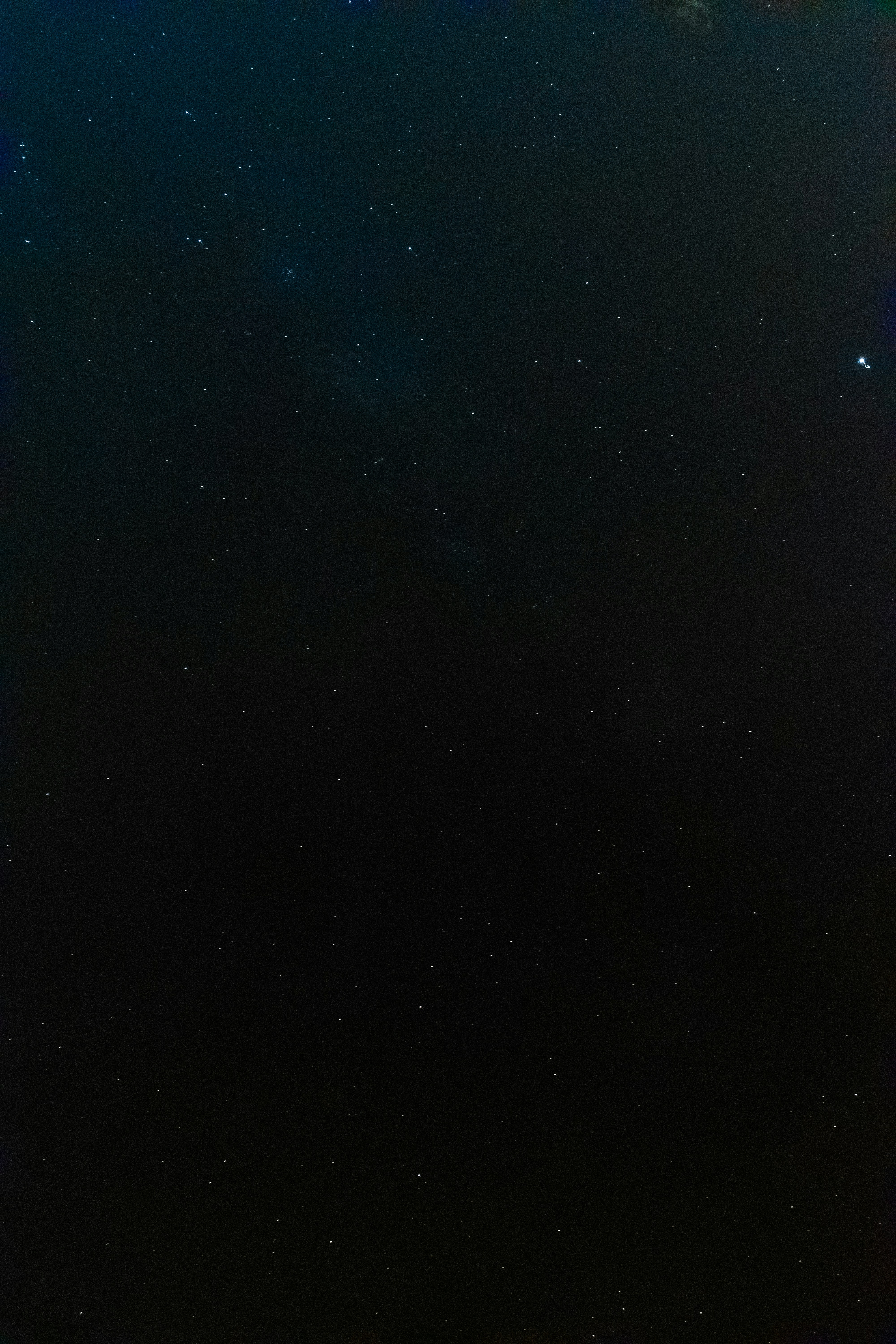 a black sky filled with stars and stars