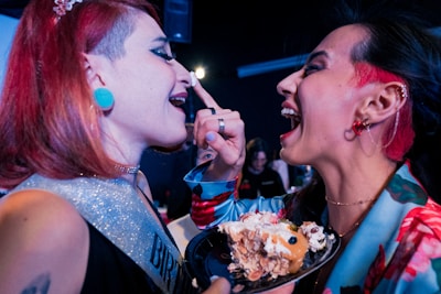 a couple of women standing next to each other