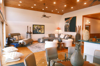 Balanced living room with natural light and vastu-inspired décor to enhance positive energy.