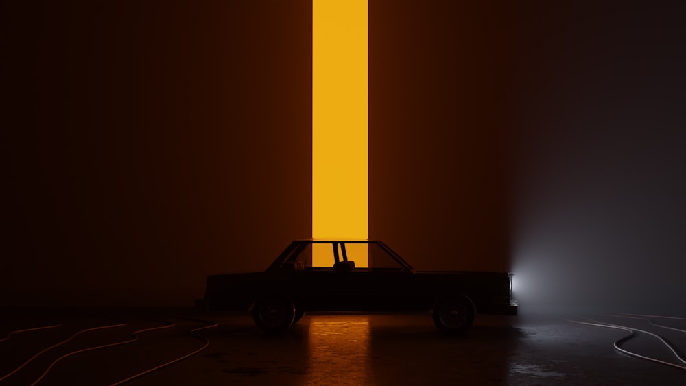 a car parked in front of a yellow light