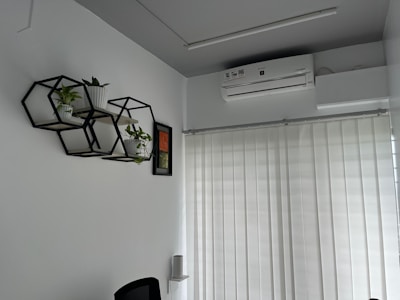 Office space with automated blinds and smart air conditioning unit