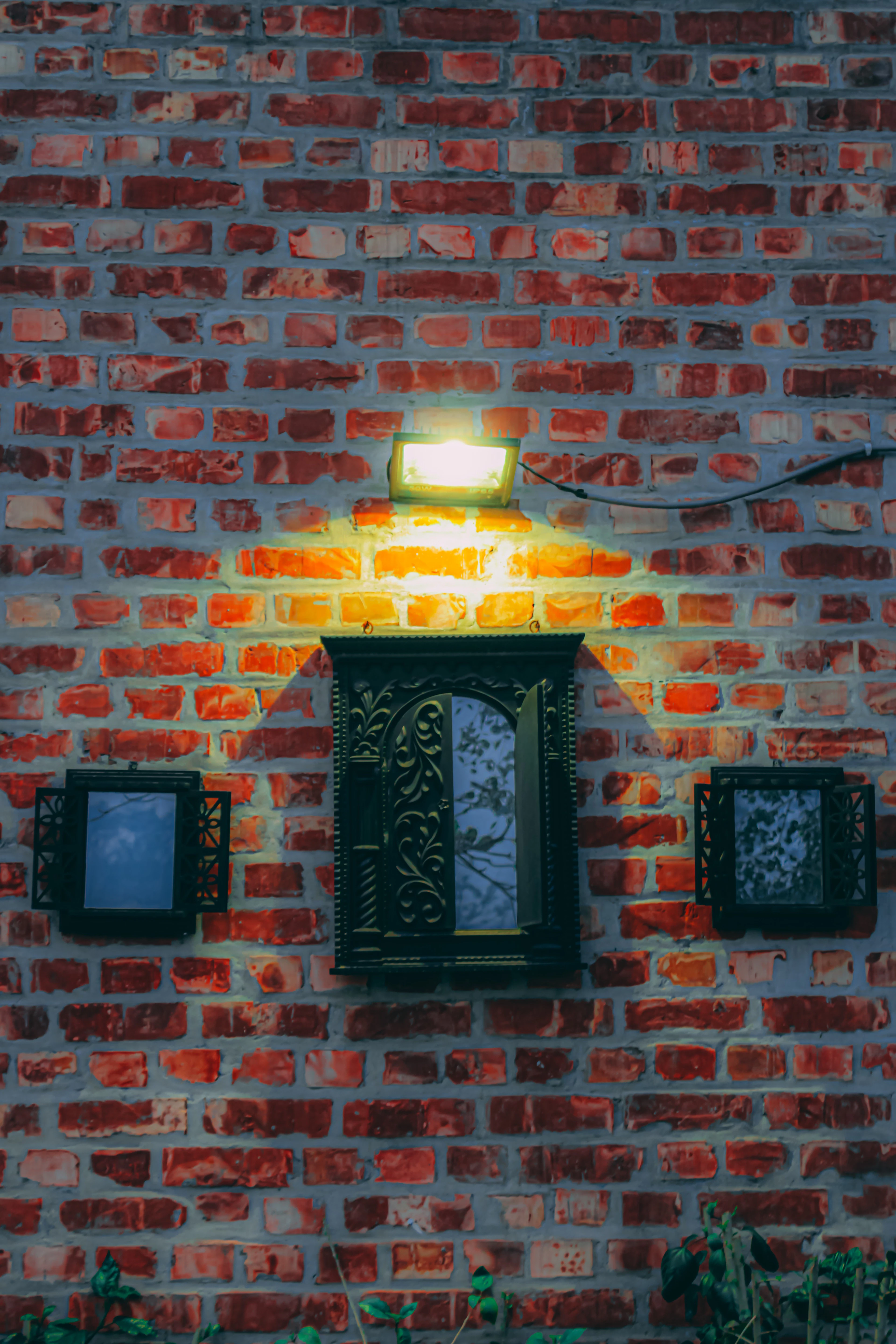 Textured feature wall with three wall lights